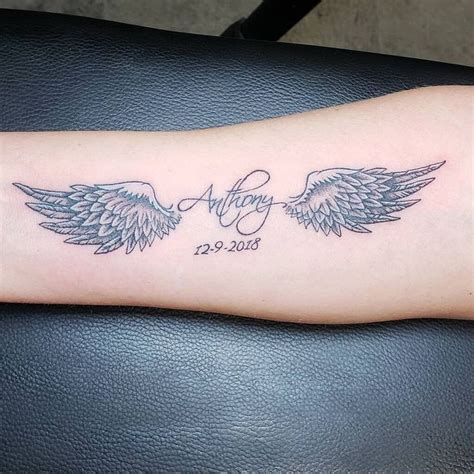 name and wings tattoo|angel wing tattoos with names.